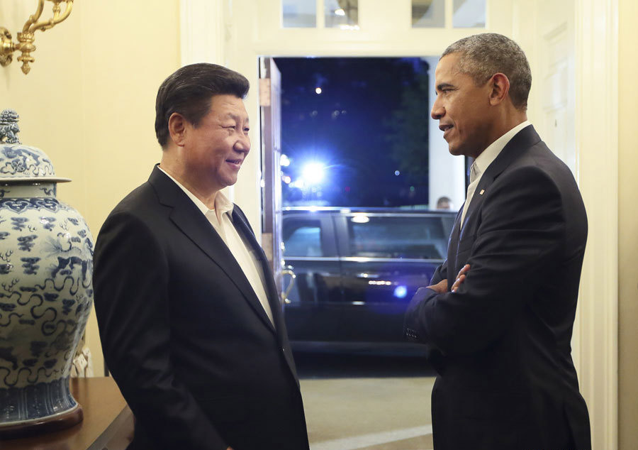 9月24日晚，国家主席习近平应美国总统奥巴马邀请来到白宫。奥巴马在门前热情迎接。然后，两国元首沿宾夕法尼亚大街一同步行前往布莱尔国宾馆举行会晤。3.jpg