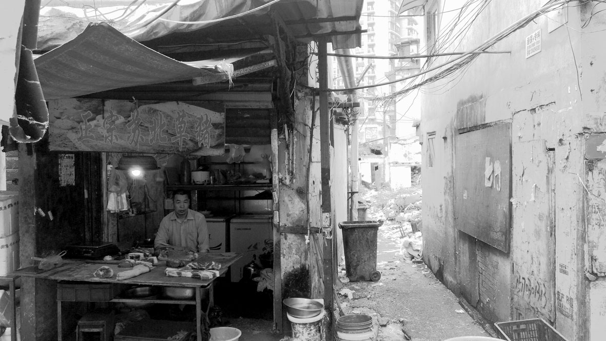 1466604206470811.jpg 里弄菜场的猪肉摊.jpg